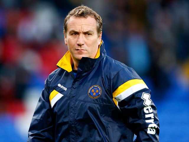 Micky Mellon, Manager of Shrewsbury Town looks on during the Capital One Cup second round match between Crystal Palace and Shrewsbury Town at Selhurst Park on August 25, 2015