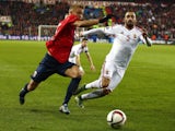 Norway's captain Per Ciljan Skjelbred and Hungary's defender Attila Fiola vie for the ball during the first-leg play off qualifier football match for the UEFA 2016 European Championship in France on Novemebr 12, 2016 in Oslo, Norway.