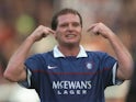 Paul Gascoigne of Rangers celebrates during a Scottish Premier League match against Dundee United at Tannadice Park in Dundee, Scotland. Dundee United won the match 2-1