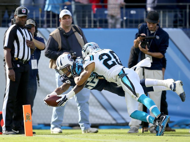 Dexter McCluster #22 of the Tennessee Titans dives for the end zone past Kurt Coleman #20 of the Carolina Panthers during the first quarter at LP Field on November 15, 2015