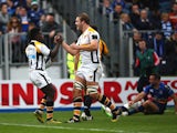 Christian Wade of Wasps (L) celebrates scoring a try with Joe Launchbury during the European Rugby Champions Cup match between Leinster Rugby and Wasps at the RDS Arena on November 15, 2015
