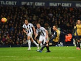 Santi Cazorla of Arsenal misses the penalty kick during the Barclays Premier League match between West Bromwich Albion and Arsenal at The Hawthorns on November 21, 2015