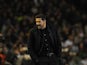 Atletico Madrid's Argentinian coach Diego Simeone shouts during the Spanish league football match Real Betis Balompie vs Club Atletico de Madrid at the Benito Villamarin stadium in Sevilla on November 22, 2015