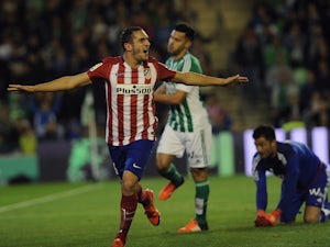 Atletico up to second with victory
