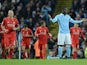 Manchester City's French defender Bacary Sagna (2nd R) gestures after team-mate French defender Eliaquim Mangala (not pictured) scored an own goal during the English Premier League football match between Manchester City and Liverpool at The Etihad stadium