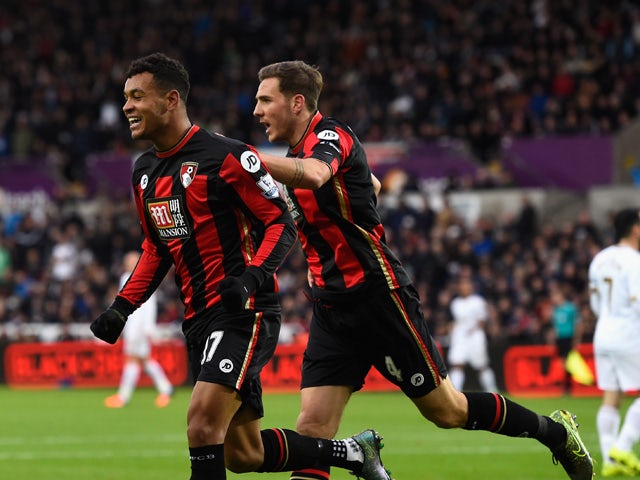  Bournemouth player Joshua King (l) and Dan Gosling celebrate the opening goal during the Barclays Premier League match between Swansea City and A.F.C. Bournemouth at Liberty Stadium on November 21, 2015