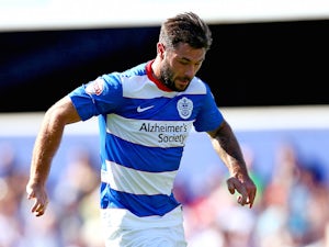 Charlie Austin of QPR in action during the Sky Bet Championship match between Queens Park Rangers and Rotherham United at Loftus Road on August 22, 2015 in London, England.