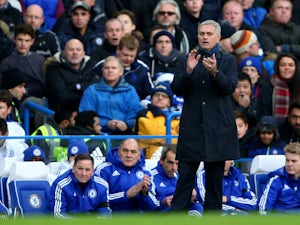 Jose Mourinho Manager of Chelsea gesutres during the Barclays Premier League match between Chelsea and Norwich City at Stamford Bridge on November 21, 2015