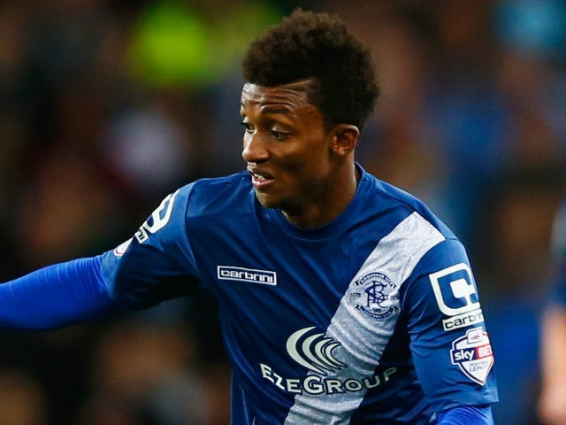 Demarai Gray of Birmingham City is chased by Ashley Westwood of Aston Villa during the Capital One Cup third round match between Aston Villa and Birmingham City at Villa Park on September 22, 2015 in Birmingham, England.