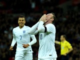 Wayne Rooney of England celebrates scoring his team's second goal during the International Friendly match between England and France at Wembley Stadium on November 17, 2015