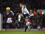 Eric Dier of Tottenham Hotspur is challenged by Manuel Lanzini of West Ham United during the Barclays Premier League match between Tottenham Hotspur and West Ham United at White Hart Lane on November 22, 2015 in London, England.