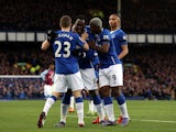 Romelu Lukaku (2nd L) of Everton celebrates scoring his team's second goal with his team mates during the Barclays Premier League match between Everton and Aston Villa at Goodison Park on November 21, 2015