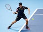 Kei Nishikori plays a shot during his group-stage match against Tomas Berdych at the ATP World Tour Finals in London on November 17, 2015