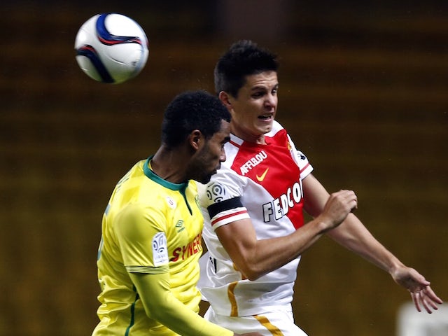 Nantes' French defender Levy Djidji (L) vies with Monaco's Argentinian forward Guido Carrillo (R) during the French L1 football match Monaco between and Nantes on november 21, 2015 at the'Louis II Stadium in Monaco.