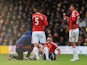 Phil Jones (2nd R) of Manchester United receives medical treatment during the Barclays Premier League match between Watford and Manchester United at Vicarage Road on November 21, 2015