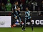 Marseille's French midfielder Georges-Kevin Nkoudou (R) celebrates with teammates Marseille's Ivorian defender Brice Djadjedje (C) and Marseille's Chilian midfielder Mauricio Anibal Isla (L) after scoring a goal during the French Ligue 1 football match be