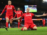 Martin Skrtel of Liverpool celebrates scoring his team's fourth goal during the Barclays Premier League match between Manchester City and Liverpool at Etihad Stadium on November 21, 2015 in Manchester, England.
