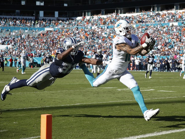 Kenny Stills #10 of the Miami Dolphins makes a 29-yard touchdown reception against Byron Jones #31 of the Dallas Cowboys in the third quarter of the game at Sun Life Stadium on November 22, 2015