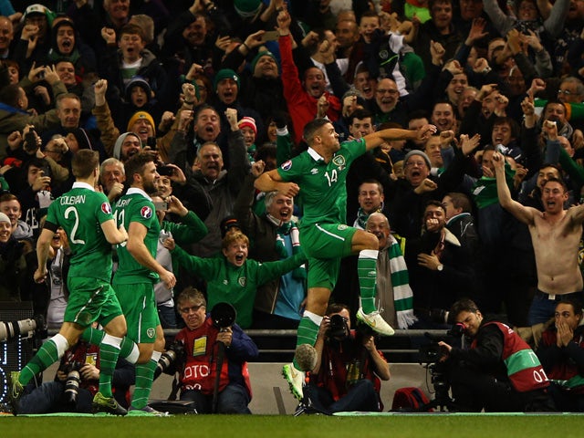 Jon Walters #14 of the Republic of Ireland celebrates after scoring the opening goal from the penalty spot during the UEFA EURO 2016 Qualifier play off, second leg match between Republic of Ireland and Bosnia and Herzegovina at the Aviva Stadium on Novemb