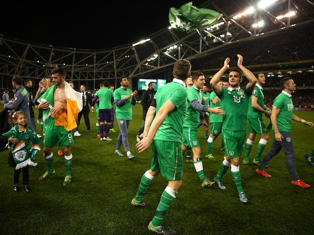 Republic of Ireland players celebrate after securing their place at the Euro 2016 finals on November 16, 2015