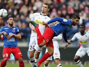 Ten-man Caen secure draw with Angers