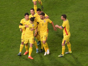 Italy held to draw by Romania