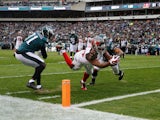 Charles Sims #34 of the Tampa Bay Buccaneers scores a touchdown against Byron Maxwell #31 and Mychal Kendricks #95 of the Philadelphia Eagles in the second quarter at Lincoln Financial Field on November 22, 2015
