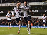 Tottenham Hotspur's English defender Kyle Walker (2nd R) celebrates with Tottenham Hotspur's English midfielder Ryan Mason after scoring their fourth goal during the English Premier League football match between Tottenham Hotspur and West Ham United at Wh