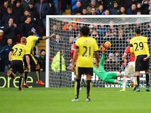 Troy Deeney of Watford scores his team's first goal from the penalty spot during the Barclays Premier League match between Watford and Manchester United at Vicarage Road on November 21, 2015