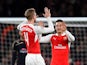 Mesut Ozil of Arsenal (r) celebrates scoring his side's first goal with Per Mertesacker of Arsenal during the UEFA Champions League match between Arsenal FC and GNK Dinamo Zagreb at Emirates Stadium on November 24, 2015