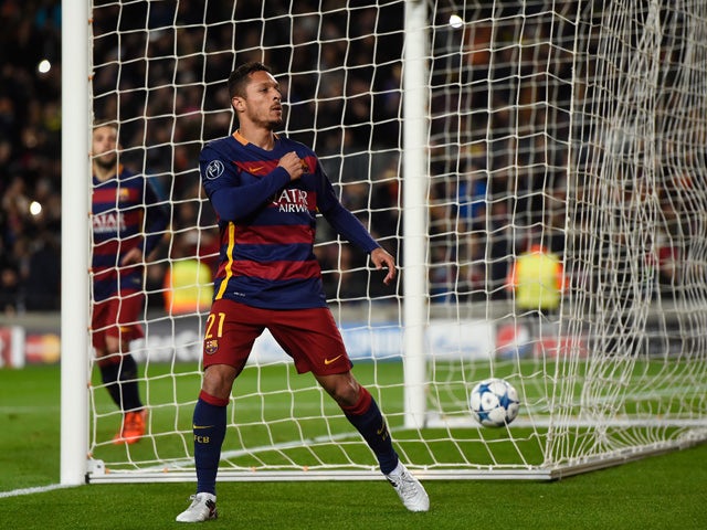 Adriano of Barcelona celebrates scoring his teams sixth goal during the UEFA Champions League Group E match between FC Barcelona and AS Roma at Camp Nou on November 24, 2015