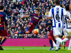 Luis Suarez of FC Barcelona scores his team's second goal during the La Liga match between FC Barcelona and Real Sociedad de Futbol at Camp Nou on November 28, 2015