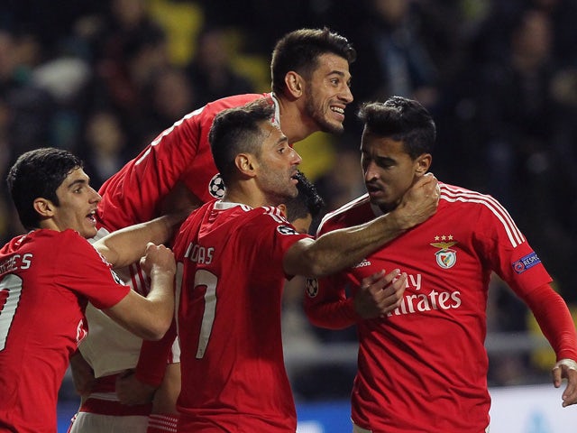 Benfica's players celebrate a goal during the UEFA Champions League group C football match between FC Astana and SL Benfica at the Astana Arena stadium in Astana on November 25, 2015.