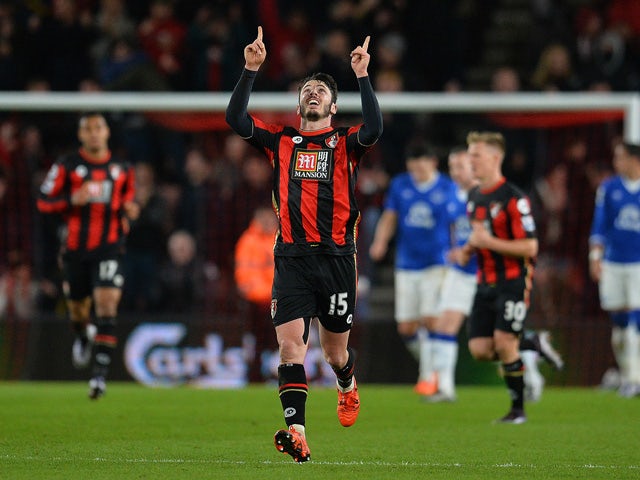Bournemouth's English defender Adam Smith celebrates scoring his team's first goal during the English Premier League football match between Bournemouth and Everton at the Vitality Stadium in Bournemouth, southern England on November 28, 2015