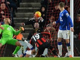 Everton's US goalkeeper Tim Howard (L) watches as Bournemouth's English midfielder Junior Stanislas (C) scores his team's second goal during the English Premier League football match between Bournemouth and Everton at the Vitality Stadium in Bournemouth, 