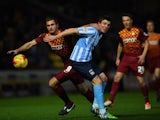 James Hanson of Bradford City battles with Chris Stokes of Coventry City during the Sky Bet League One match between Bradford City and Coventry City at Coral Windows Stadium on November 24, 2015 
