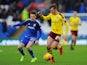 Chris Long of Burnley is tackled by Craig Noone of Cardiff City during the Sky Bet Championship match between Cardiff City and Burnley at the Cardiff City Stadium on November 28, 2015