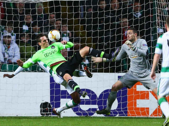 Arkadiusz Milik of Ajax (C) scores their first and equalising goal during the UEFA Europa League Group A match between Celtic FC and AFC Ajax at Celtic Park on November 26, 2015 in Glasgow, United Kingdom. 