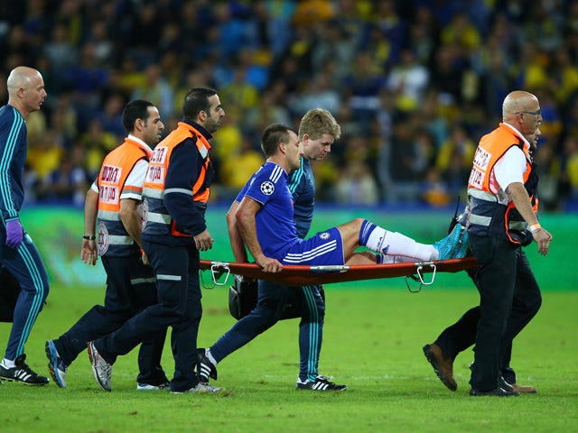 John Terry of Chelsea leaves the field on a stretcher during the UEFA Champions League Group G match between Maccabi Tel-Aviv FC and Chelsea FC at Sammy Ofer Stadium on November 24, 2015