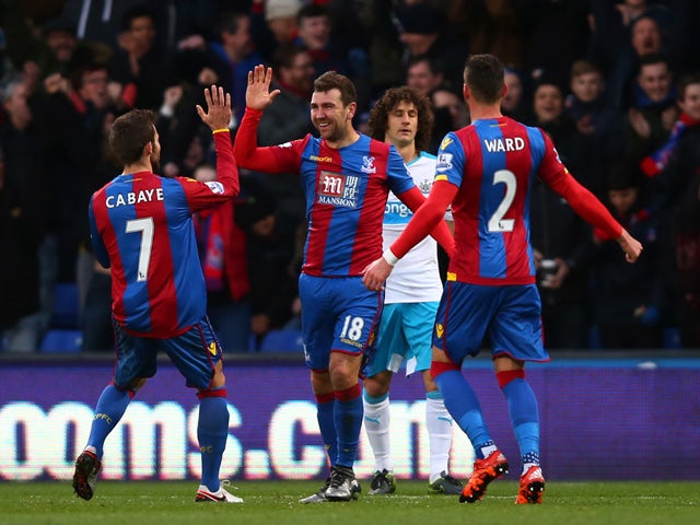 James McArthur (C) of Crystal Palace celebrates scoring his team's first goal with his team mates Yohan Cabaye (L) and Joel Ward (R) during the Barclays Premier League match between Crystal Palace and Newcastle United at Selhurst Park on November 28, 2015