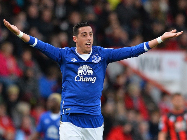 Everton's Argentinian defender Ramiro Funes Mori celebrates scoring his team's first goal during the English Premier League football match between Bournemouth and Everton at the Vitality Stadium in Bournemouth, southern England on November 28, 2015