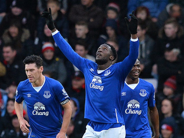 Everton's Belgian striker Romelu Lukaku (C) celebrates scoring his team's second goal during the English Premier League football match between Bournemouth and Everton at the Vitality Stadium in Bournemouth, southern England on November 28, 2015