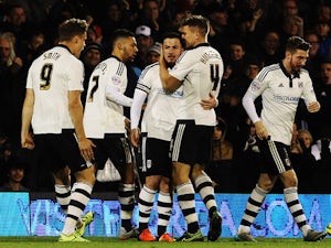 Ross McCormack (C) of Fulham celebrates with team mates after scoring during the Sky Bet Championship match between Fulham and Preston North End at Craven Cottage on November 28, 2015