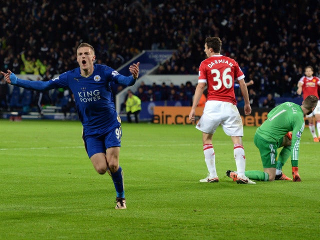 Leicester City's English striker Jamie Vardy (L) celebrates after scoring during the English Premier League football match between Leicester City and Manchester United at the King Power Stadium in Leicester, central England on November 28, 2015.
