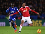 Anthony Martial of Manchester United and Ngolo Kante of Leicester City compete for the ball during the Barclays Premier League match between Leicester City and Manchester United at The King Power Stadium on November 28, 2015 in Leicester, England.