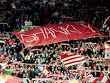 Liverpool fans mark the 40th anniversary of Bill Shankly's arrival at the club before the FA Carling Premiership match against Coventry City at Anfield in Liverpool on 18 December, 1999