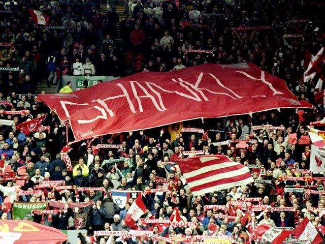 Liverpool fans mark the 40th anniversary of Bill Shankly's arrival at the club before the FA Carling Premiership match against Coventry City at Anfield in Liverpool on 18 December, 1999