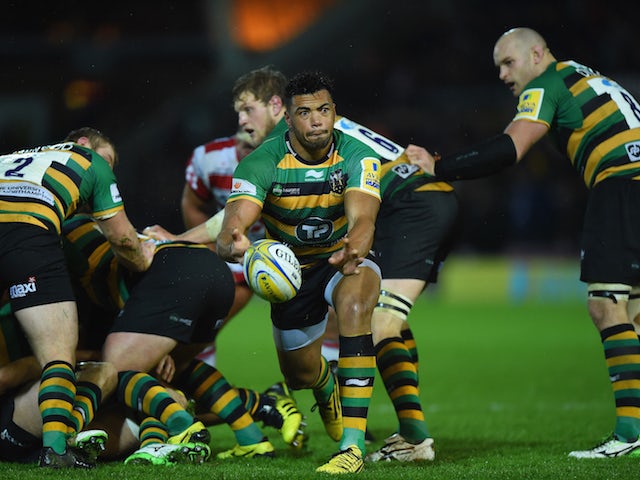 Luther Burrell of Northampton Saints passes the ball during the Aviva Premiership match between Northampton Saints and Gloucester Rugby at Franklin's Gardens on November 27, 2015 in Northampton, England.