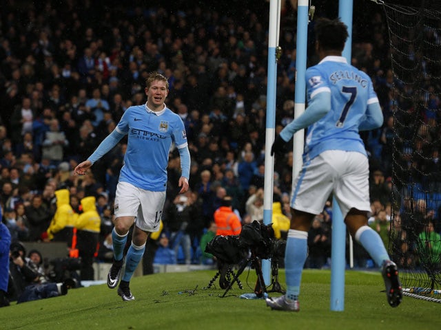 Manchester City's Belgian midfielder Kevin De Bruyne (L) celebrates after scoring during the English Premier League football match between Manchester City and Southampton at The Etihad stadium in Manchester, north west England on November 28, 2015