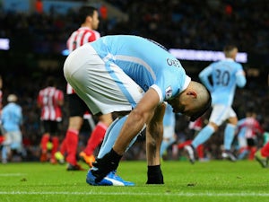 Sergio Aguero of Manchester City picks up an injury during the Barclays Premier League match between Manchester City and Southampton at the Etihad Stadium on November 28, 2015